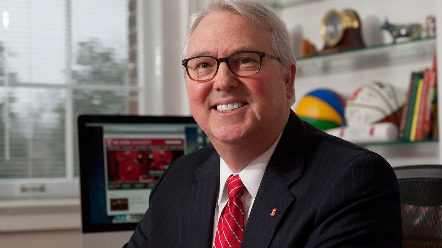 NC State Chancellor Woodson at his desk in Holladay Hall.